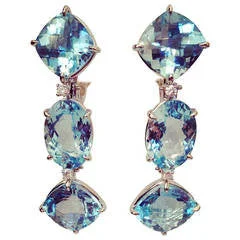 Silk tassel earrings-18kt White Gold Blue Topaz and Diamond Three Stone Cushion Drop Earring