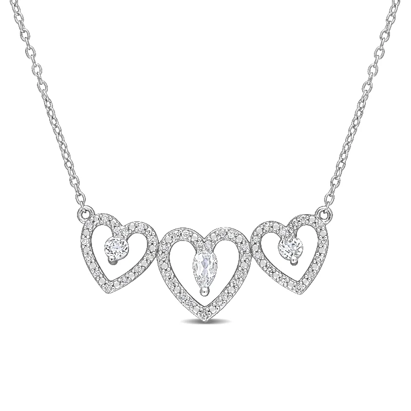 Vibrant enamel necklaces-Miadora White Topaz and 1/5ct TDW Diamond Accent Triple Heart Station Necklace in Sterling Silver